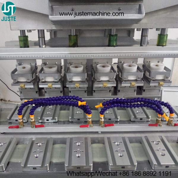 Μηχανή εκτύπωσης 6 έγχρωμων μαξιλαριών Εκτυπωτές Tampo Pad με 18 Jig Conveyor 3